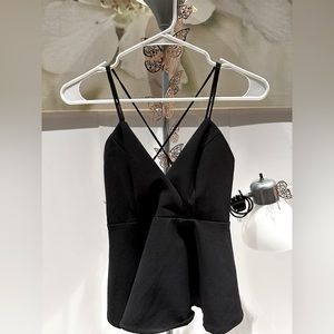 Black strappy peplum tank top